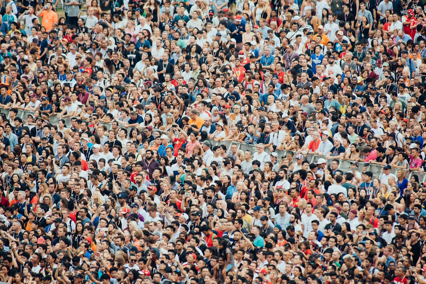 A large crowd gathered at a venue, seen from above